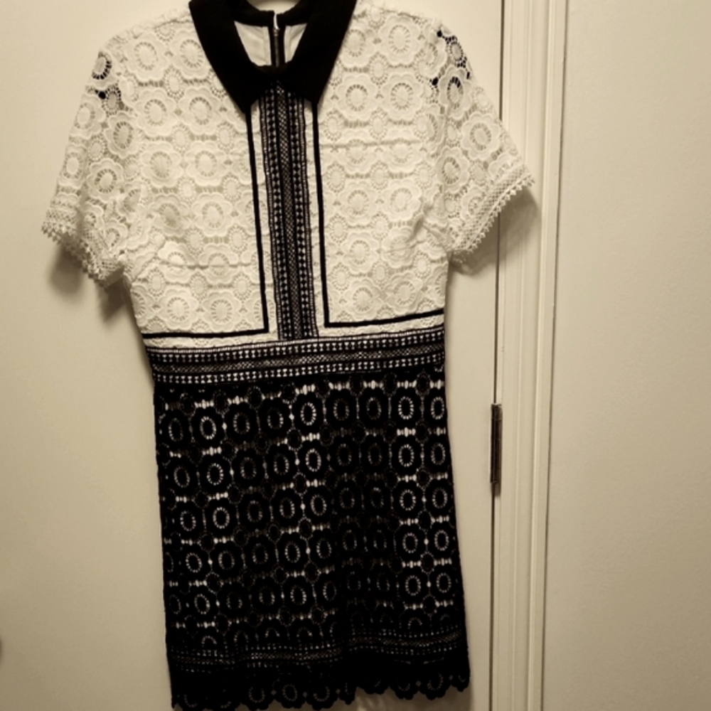 Elegant Black and White Lace Mini Dress